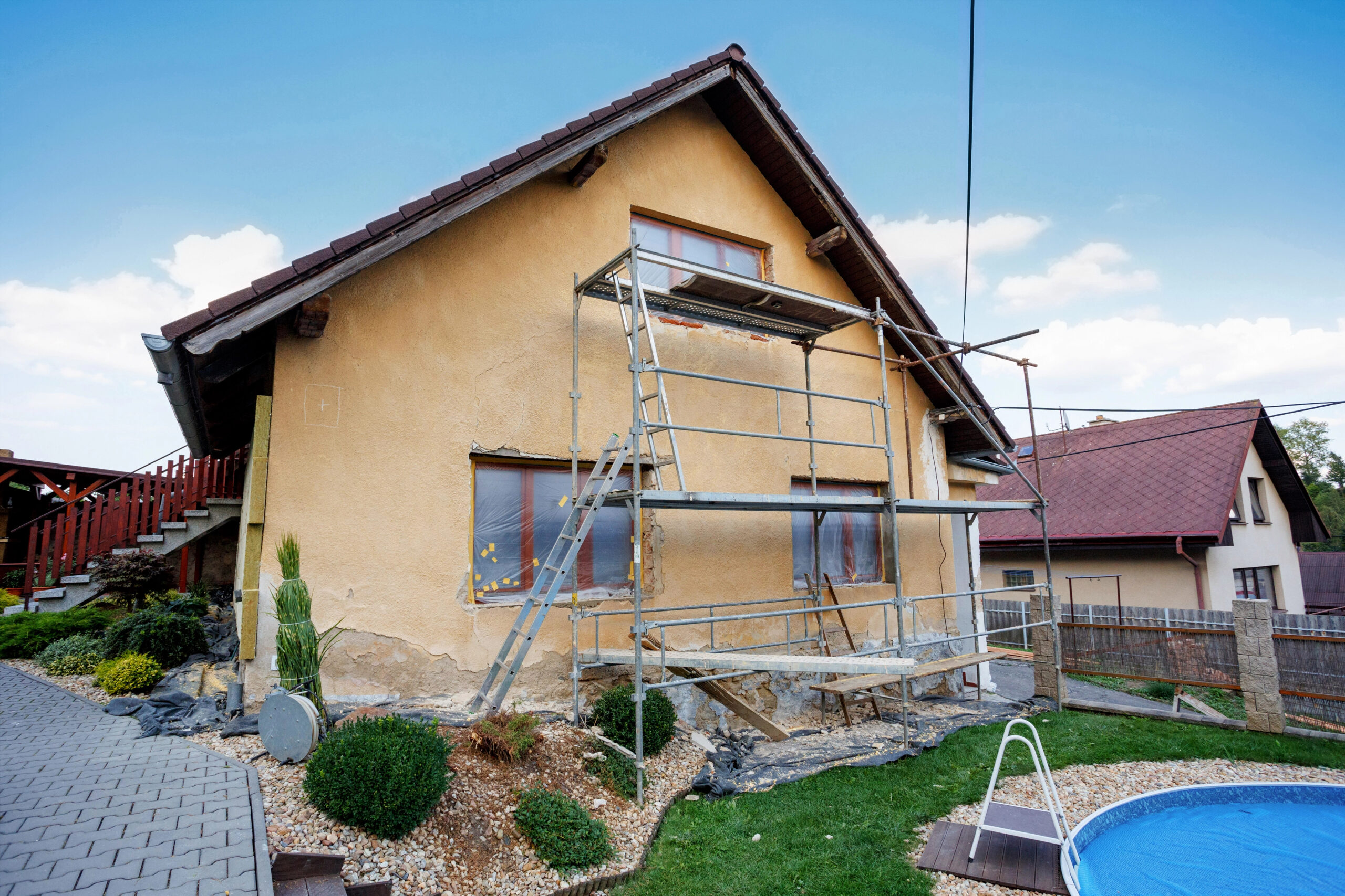 Depositphotos_49369391_XL Exterior of a home undergoing professional restoration